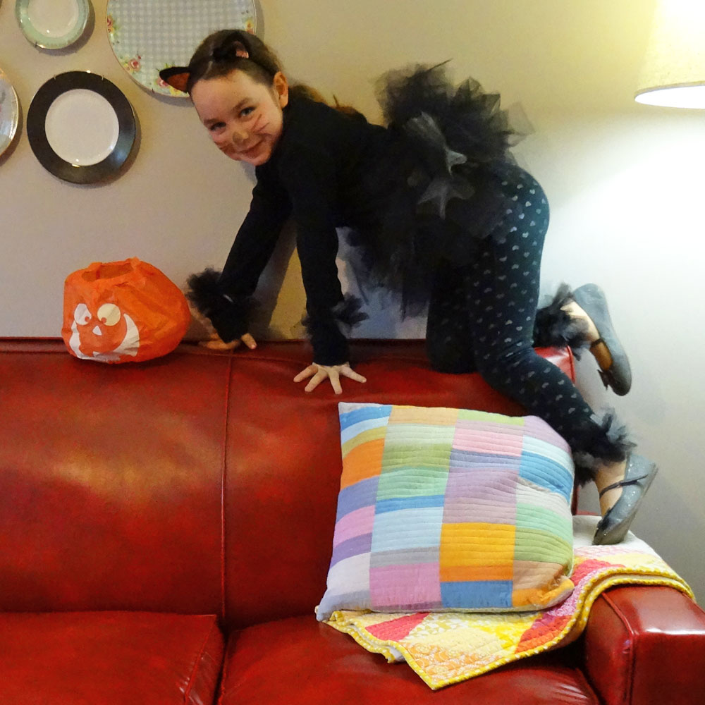 Black Cat Costume Back of Couch