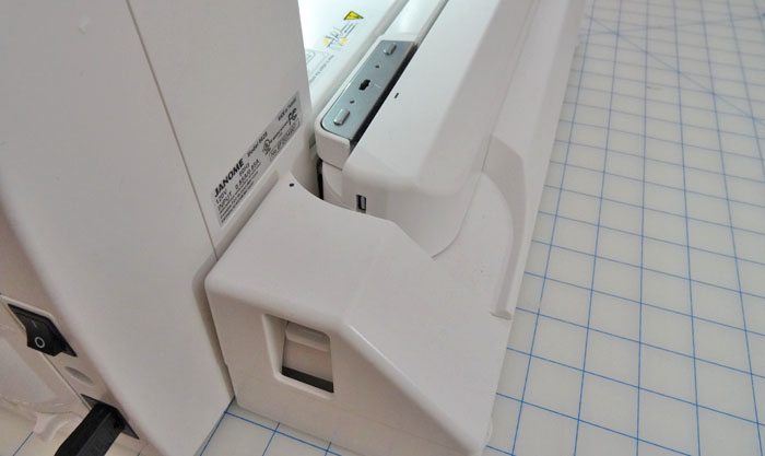 Closed embroidery arm